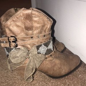 Cowboy style ankle booties with bow and bling